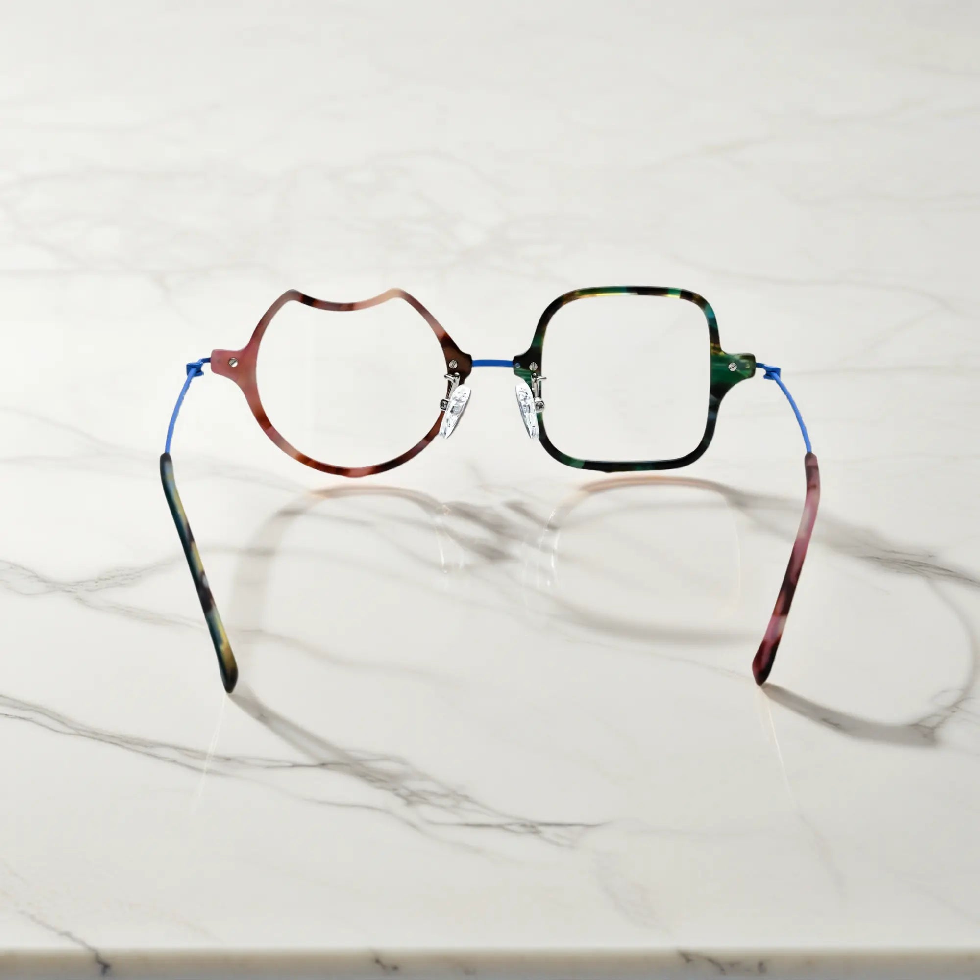 Back View of VoyueLens™ Ocean Brick abstract eyeglasses VL185842. Rear view displaying the acetate frame and the titanium temple connection structure.